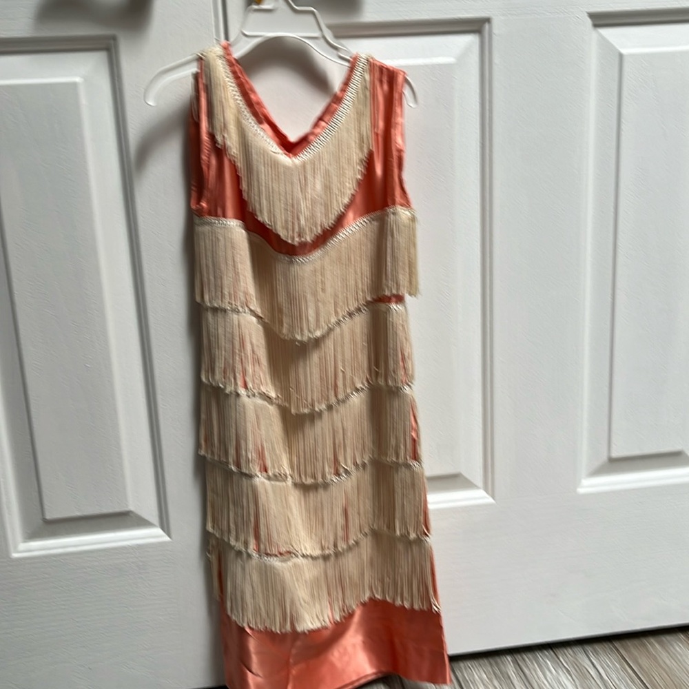 Authentic hand made flapper girl dress with pearls and head piece.